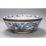 A large Chinese blue and white crackle glazed 'dragon' bowl, 19th century, diameter 37cm
