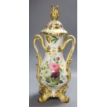 A Victorian porcelain floral painted vase and cover (a.f.) height 44cm