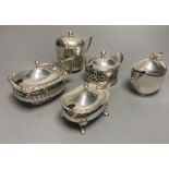 A late Victorian demi fluted silver mustard pot, London, 1894 and four other assorted later silver