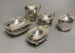 A late Victorian demi fluted silver mustard pot, London, 1894 and four other assorted later silver