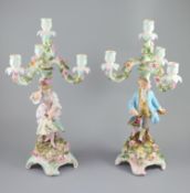 A pair of early 20th century Plaue porcelain figural candelabra, overall height 48cm