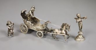 An early 20th century Continental white metal toy chariot, 10.3cm, an Edwardian silver cherub on a