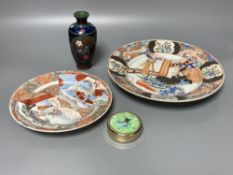 Two Japanese plates, a cloisonne vase and a seal paste box, largest 24.5cm