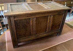 A small 18th century style panelled oak coffer, length 76cm, depth 40cm, height 45cm