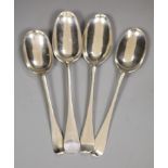 Four 18ct century base marked silver Old English or Hanovarian table spoons including WT, London,