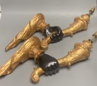 A pair of gilt and ebonised carved wood 'hand and cornucopia' wall sconces, height 52cm not