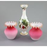 A French opaline glass vase with applied 'grapes' and a pair of Webb style ruby and white glass