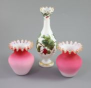 A French opaline glass vase with applied 'grapes' and a pair of Webb style ruby and white glass