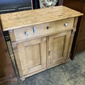 A 19th century East European pine side cabinet, width 98cm, depth 47cm, height 94cm