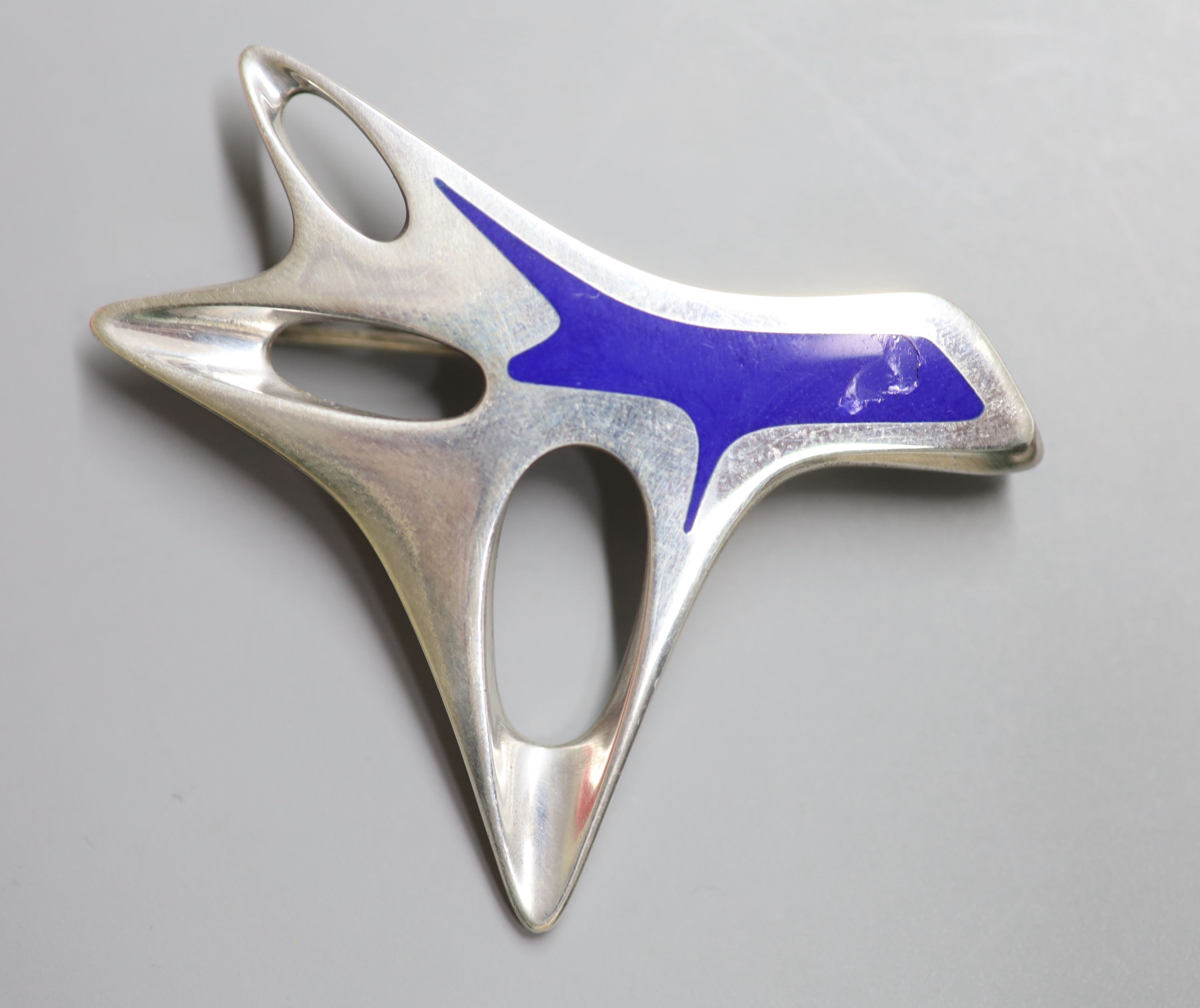 A Henning Koppel for Georg Jensen 925 and blue enamel pierced stylised tree brooch, design no.