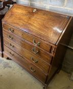 A George III mahogany bureau (split front flap), width 107cm, depth 56cm, height 110cm