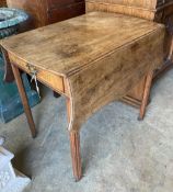 A George III mahogany Pembroke table, with serpentine shaped top, single drawer, on square section