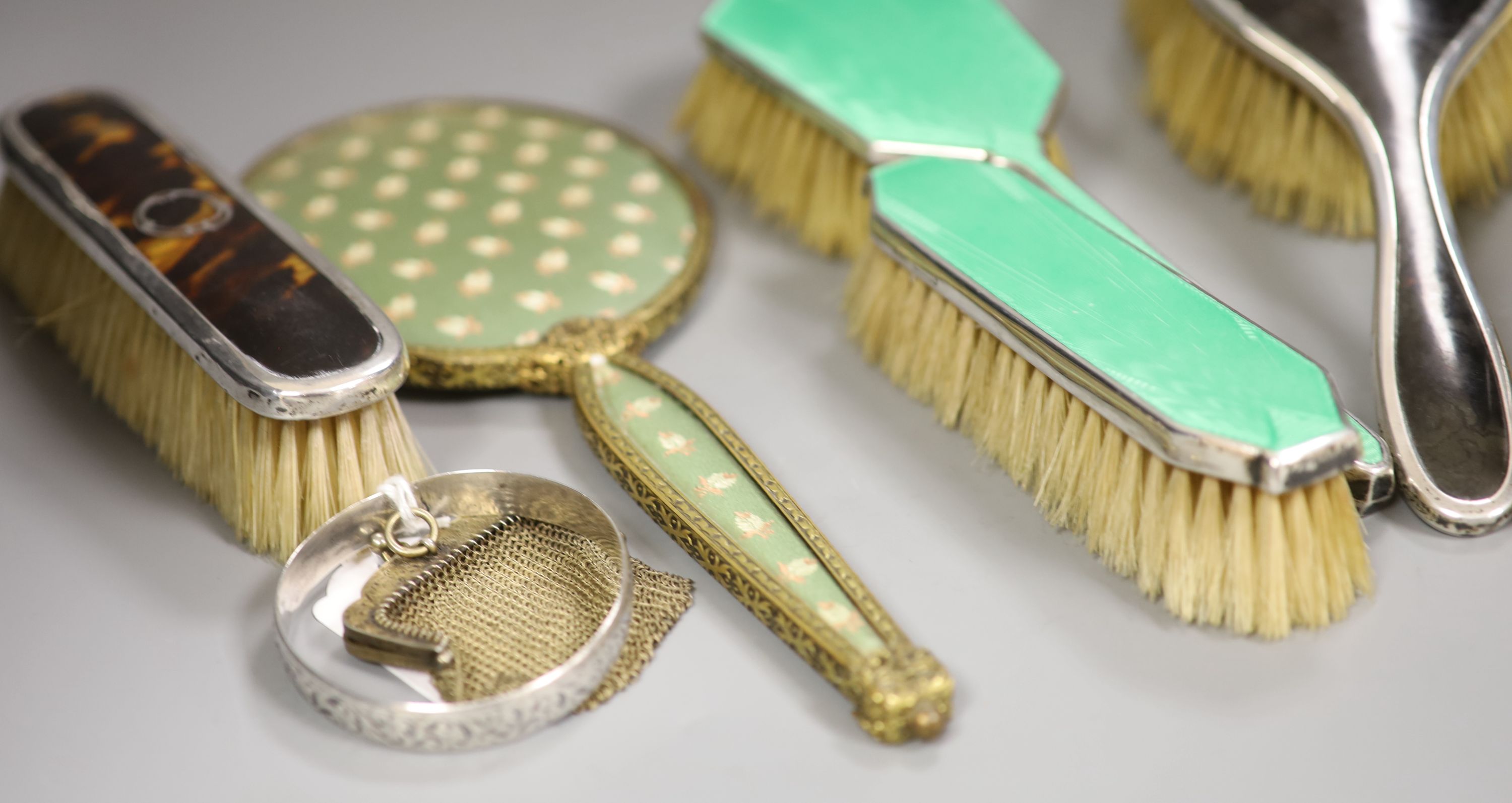 A guilloche enamel and silver-mounted three-piece brush and comb set, three other silver-mounted - Image 2 of 4