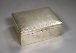 A George V engine turned rectangular cigarette box, Birmingham, 1918, 11.5cm, with engraved