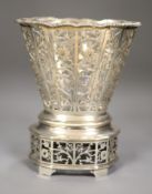 A George V pierced silver vase with glass liner, William Comyns, London, 1910, height 16.8cm, 10.