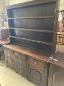 A mid 18th century oak dresser, length 154cm, depth 39cm, height 190cm