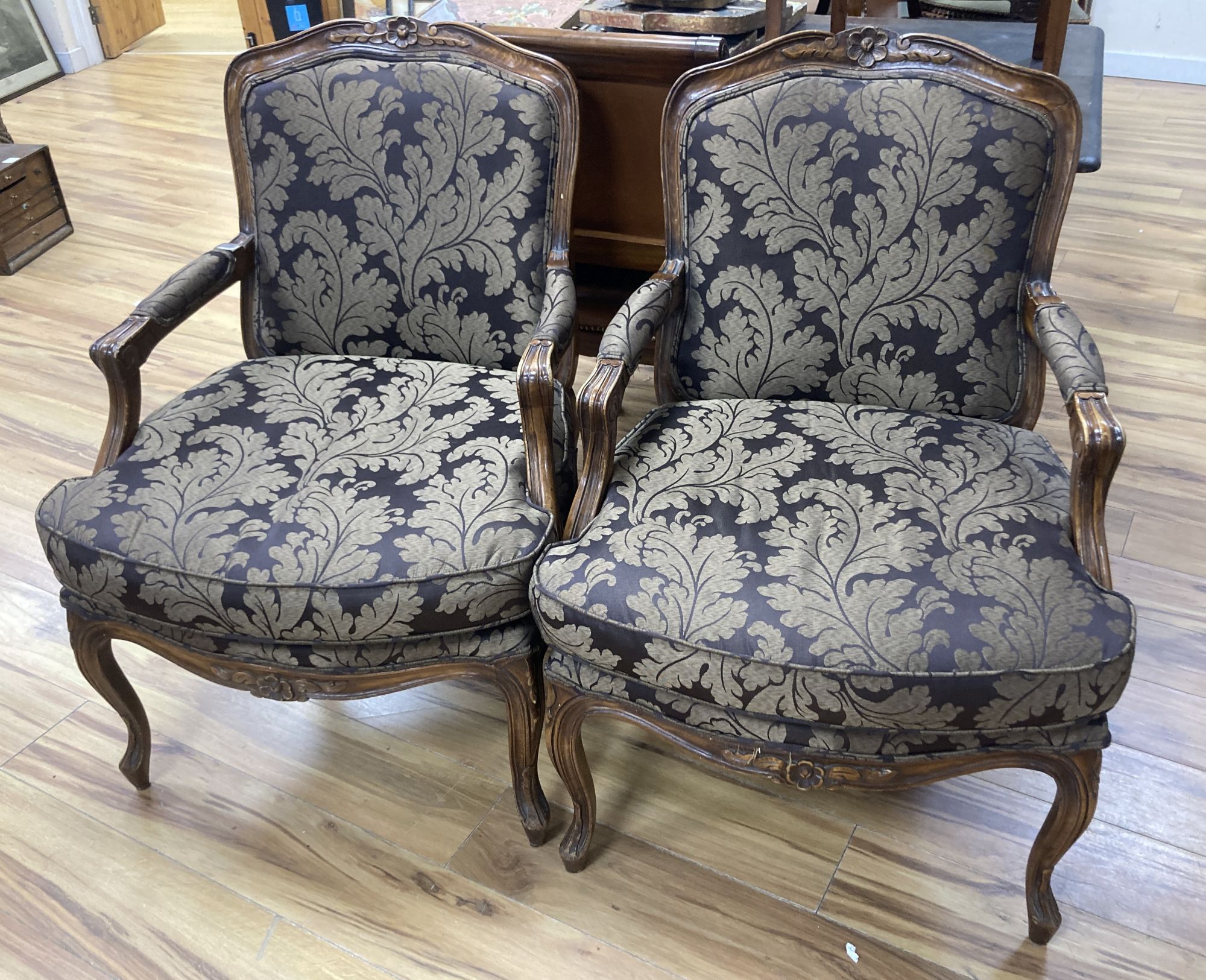 A pair of Louis XVI design beech open armchairs from The Grand Hotel, Brighton, width 65cm, depth