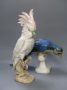 A Royal Dux ceramic parrot and cockatoo, tallest 40cm