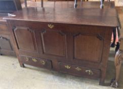 A mid century oak mule chest, width 140cm, depth 54cm, height 86cm