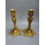 A pair of Louis XV style ormolu candlesticks, height 26.5cm