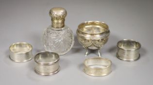 An Edwardian silver and glass globular scent bottle, a Continental cauldron shaped salt and four