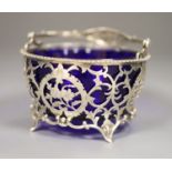 An Edwardian silver sugar basket with blue glass liner, Robert William Jay, Birmingham,1910,