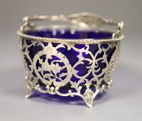 An Edwardian silver sugar basket with blue glass liner, Robert William Jay, Birmingham,1910,