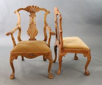 A set of eight Chippendale style mahogany dining chairs, including two carvers, with scallop and