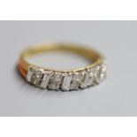 A modern 18ct gold, fives stone baguette and ten stone round cut diamond cluster set half hoop ring,