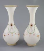 A pair of French or Bohemian frosted opaline 'jewelled' glass vases, height 34cm