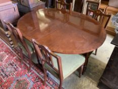 A Victorian style banded mahogany drop flap dining table, 138cm extended together with a set of four