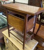 A late Victorian aesthetic movement walnut folding card table, with hinged undertiers, width 71cm,