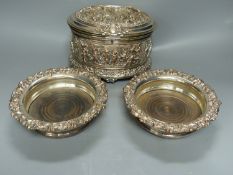 A Dutch embossed plated casket, length 19cm, and pair of plated wine coasters