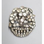 A white metal and paste set giardinetto brooch, 33mm.