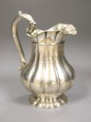 A 19th century continental white metal cream jug, 15.3cm, 9oz.