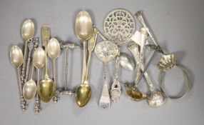 A set of six Victorian silver cupid finial coffee spoons and sundry decorative spoons including