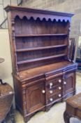 A Victorian North Country mahogany and pine breakfront dresser, width 165cm, depth 49cm, height