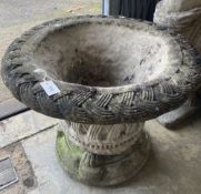 A large Lucas reconstituted stone garden planter on lions paw plinth foot, diameter 74cm, height