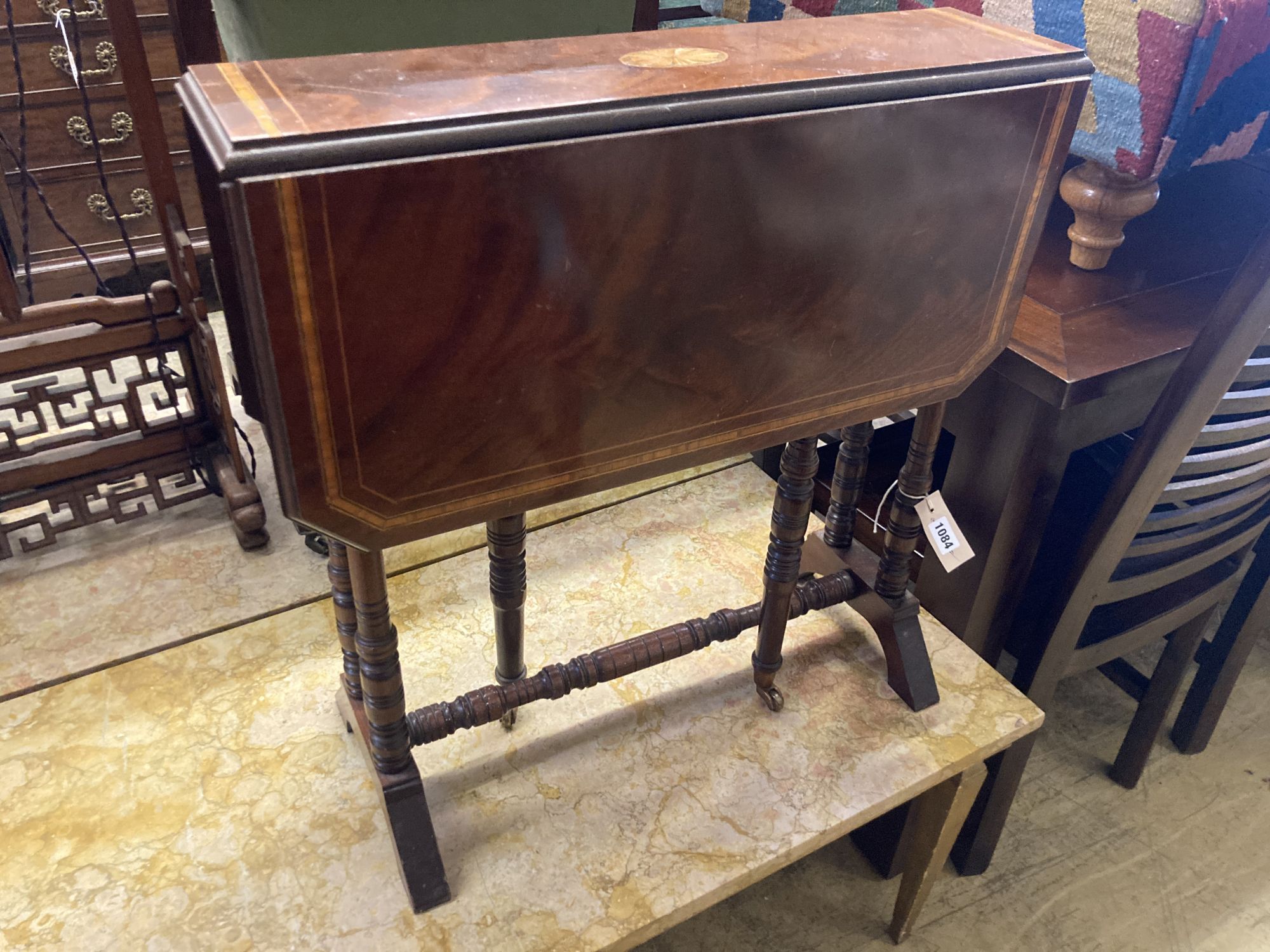 An Edwardian inlaid mahogany Sutherland table, width 60cm, depth 16cm, height 61cm