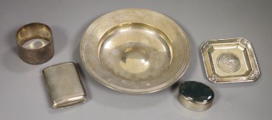 A modern silver armada dish, 14.6cm, a silver napkin ring, silver ashtray, a silver vesta? and a