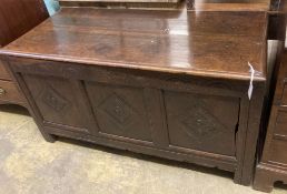 An 18th century carved oak coffer, length 134cm, depth 60cm, height 72cm