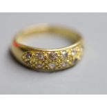 A modern 18ct gold and twelve stone diamond chip set cluster ring, size K, gross 3.7 grams.