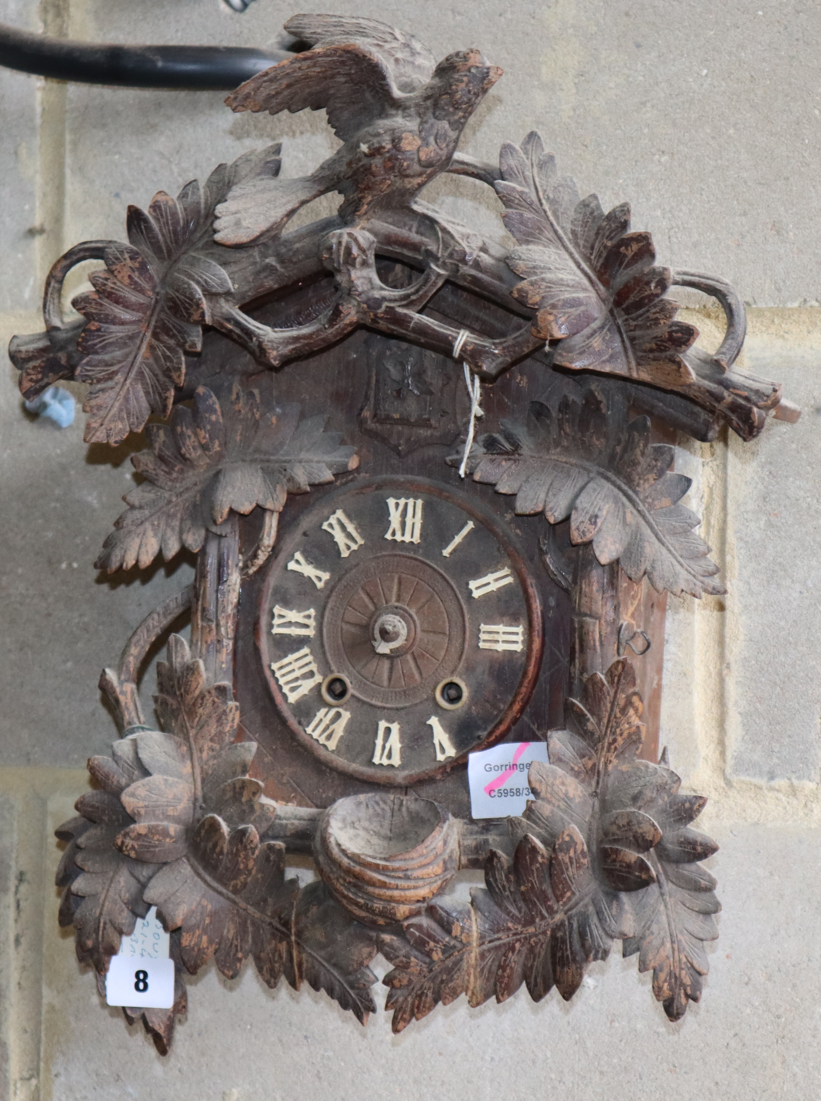 A late 19th century Black Forest cuckoo clock, W.33cm, D. 14cm, H.42cmCONDITION: Has movement and