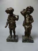 A pair of 19th century bronze figures emblematic of Summer & Autumn, on marble bases, overall 21cm