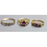 An Edwardian 18ct gold and graduated sapphire and diamond five stone ring, size L, an early 20th