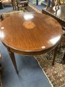 An Edwardian satinwood banded mahogany oval topped centre table, width 106cm, depth 90cm, height