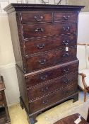 A George III mahogany chest on chest, two short and three long graduated drawers, the base with