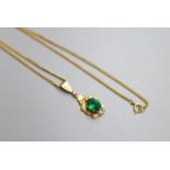 A modern 9ct gold and green paste set pendant, 20mm, on a 9ct gold chain, 50cm, gross 4.7 grams.