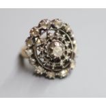 An antique yellow and white metal, rose cut diamond set dress ring, size P/Q, gross 15.6 grams.