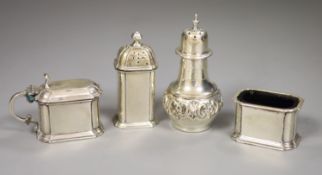 A George V three piece silver cruet set, Harrod's Ltd, Birmingham, 1934 and a silver pepperette.